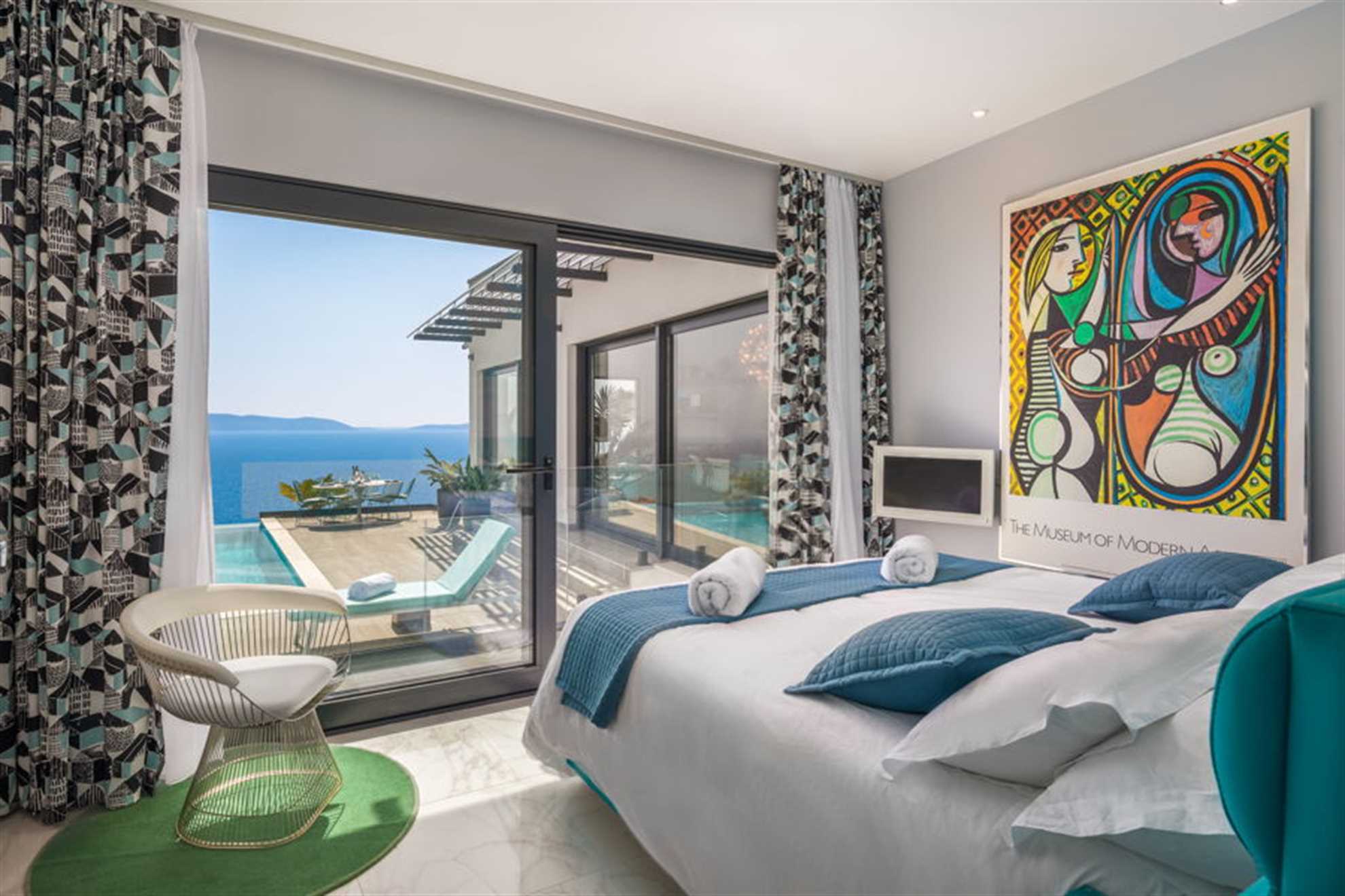 Bedroom near the pool terrace with sea view