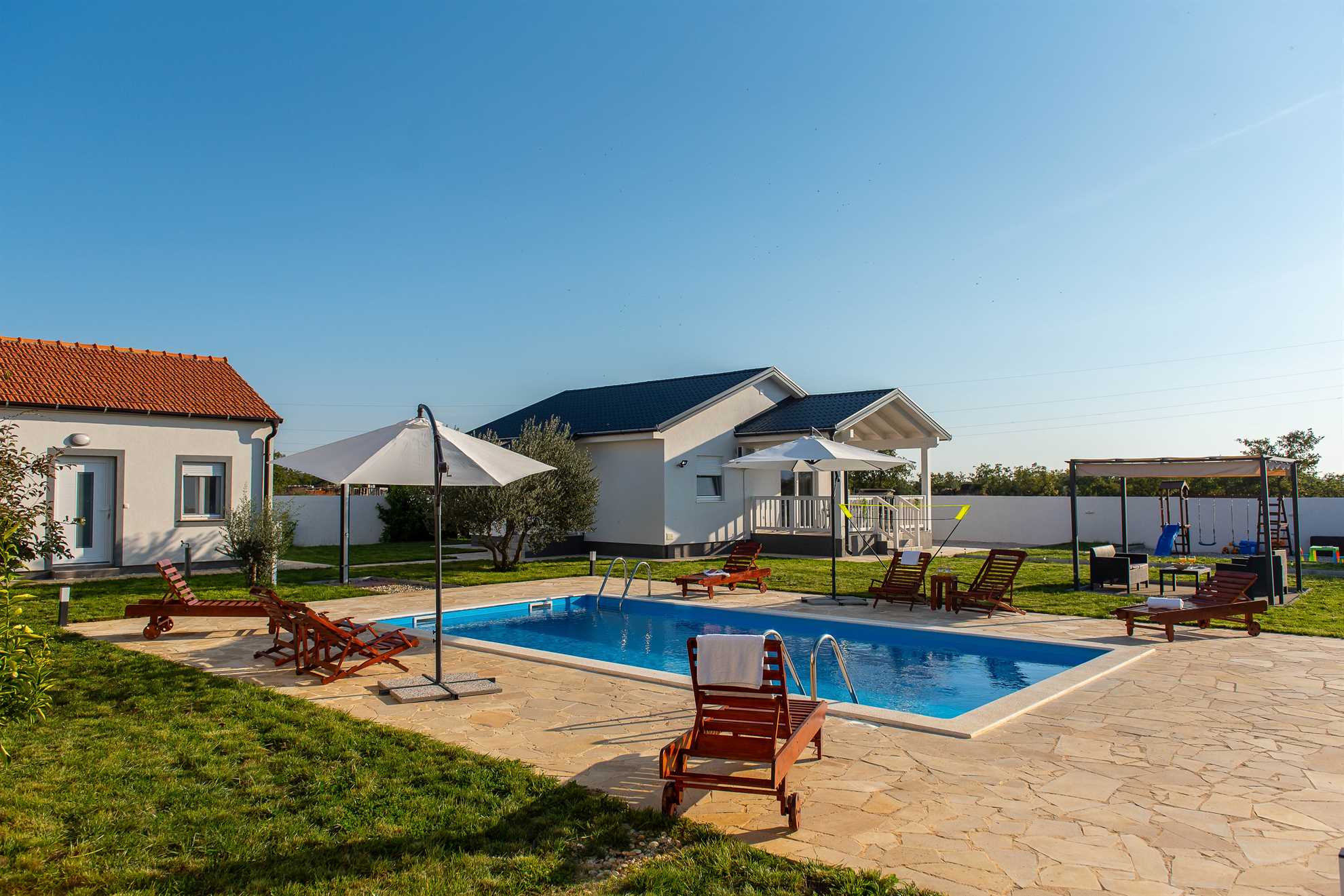 Holiday home Relax with swimming pool